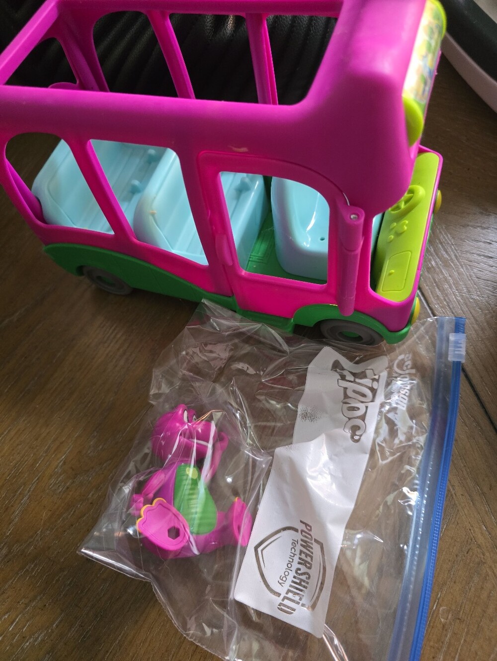Barney Bright Pink and Green Kids Toy Bus with Light Blue Seats